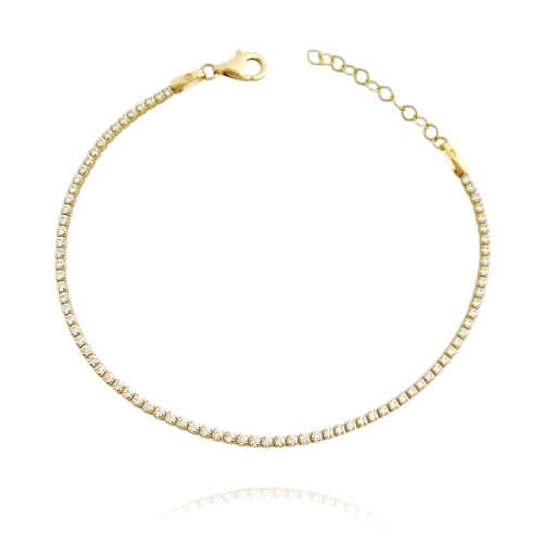 Złota bransoletka, tenisowa, ozdobiona białymi cyrkoniami, wykonana z najlepszej jakości złota próby 585. Bransoletka posiada regulację długości.